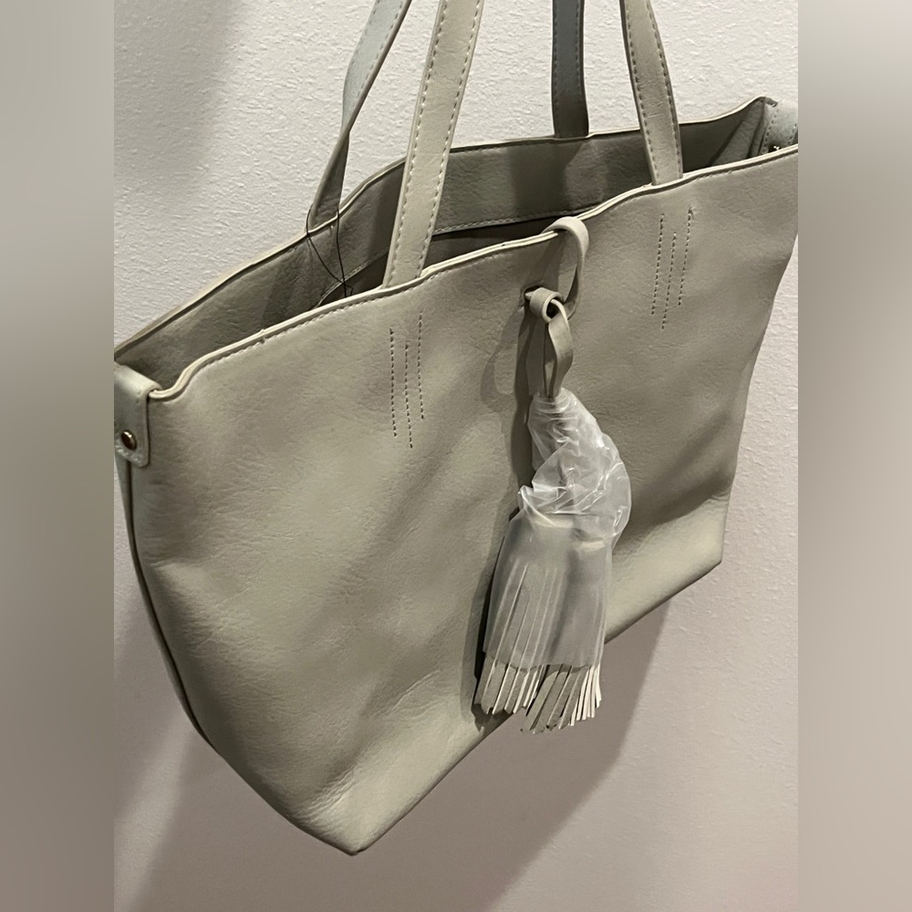 Large light gray tote bag in a bag. NWT
